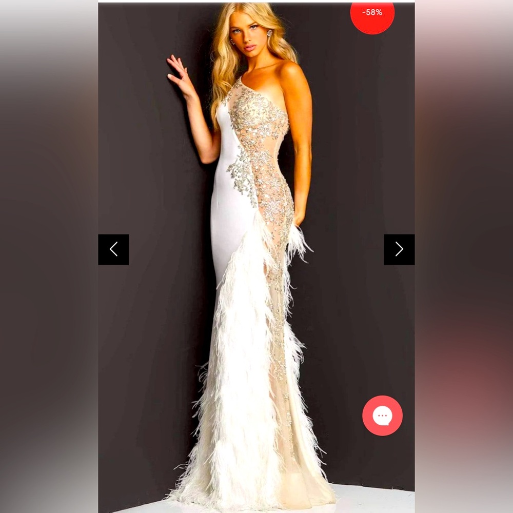 White one shoulder gown with feathers and jewels